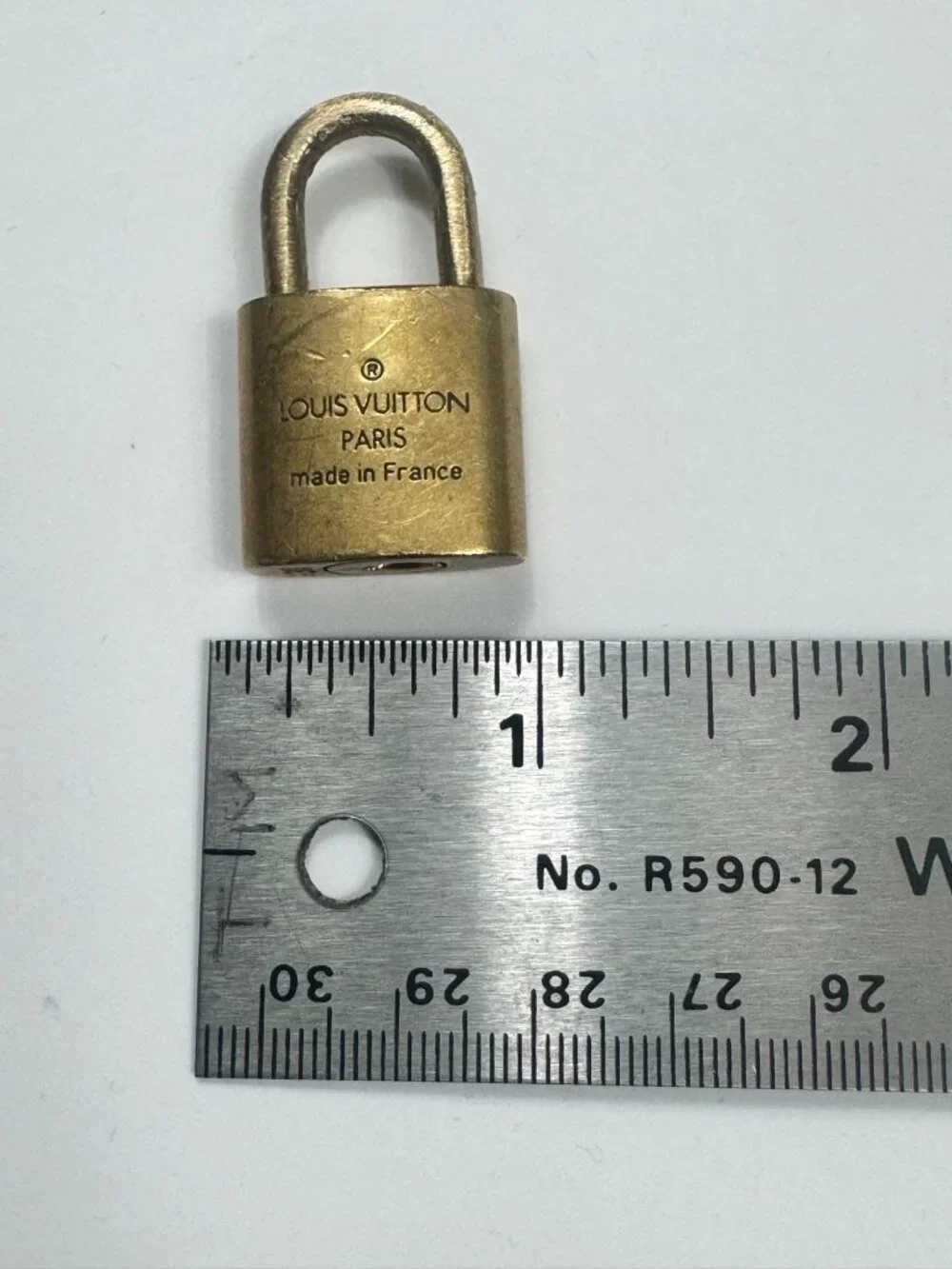 Authentic Louis Vuitton Lock No Key Gold Tone